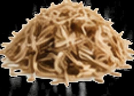 Loose pile of natural wood fiber hydroseeding mulch